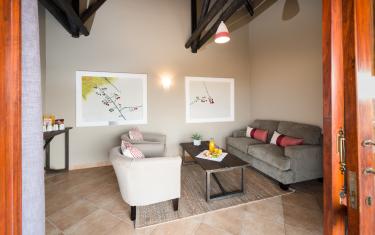 Safarihoek Lodge - Familien-Suite Lounge